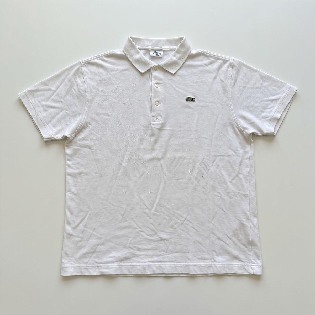 KI-Cover: Vintage Lacoste Poloshirt (M), aus unseren Fotos geglättet (Zustand siehe echte Fotos)