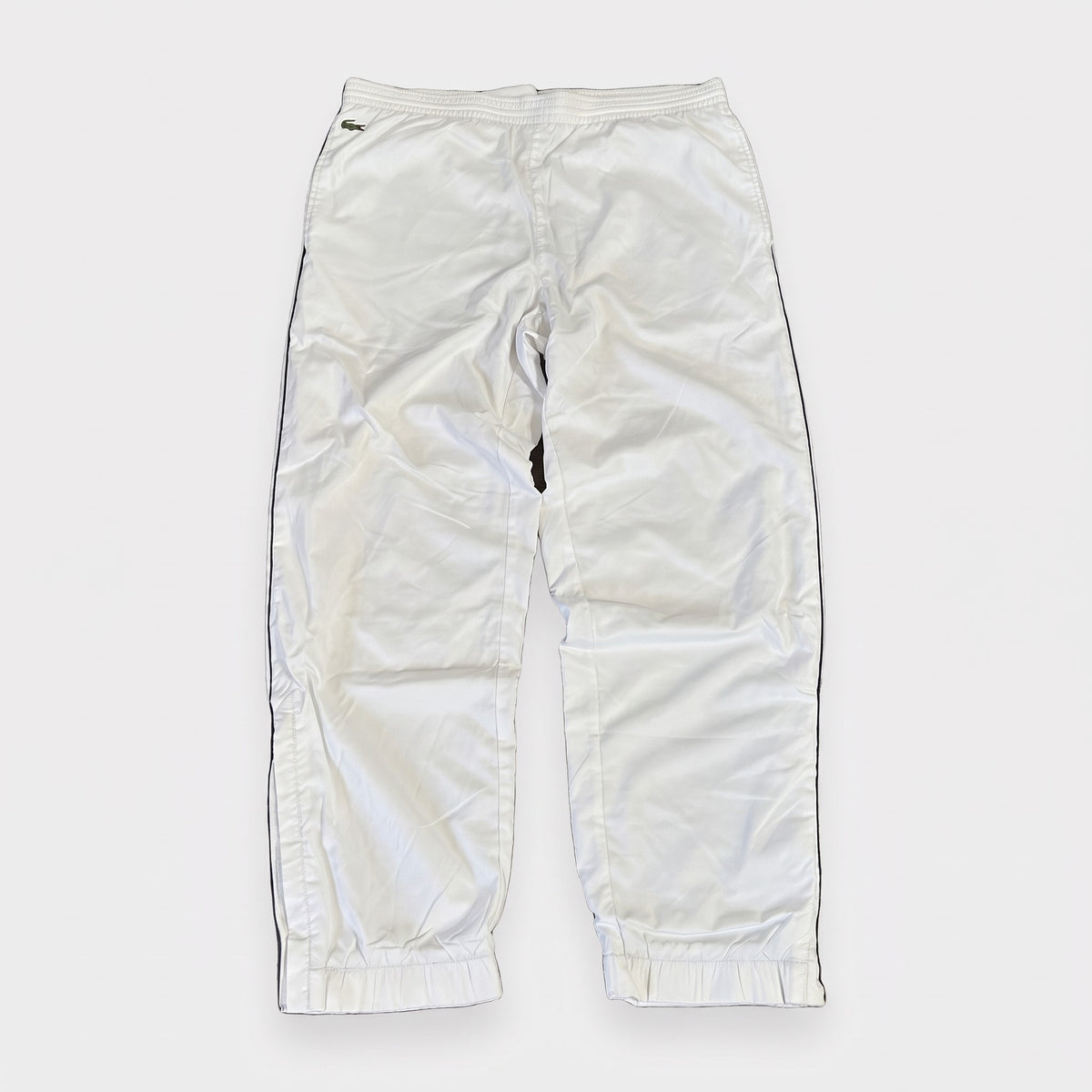 KI-Cover: Vintage Lacoste Trackpants (L), aus unseren Fotos geglättet (Zustand siehe echte Fotos)