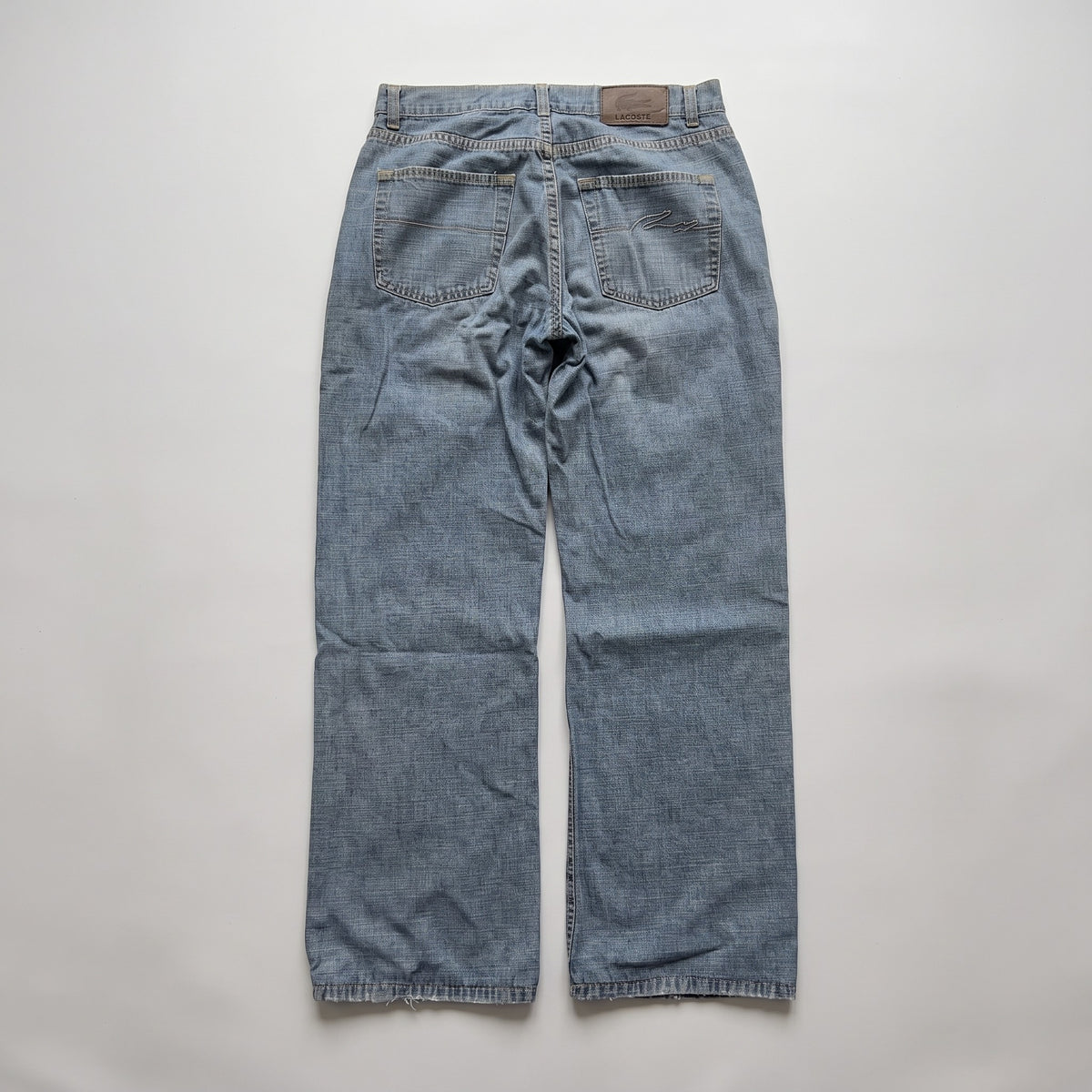 KI-Cover: Vintage Lacoste Jeans (W33 L29), aus unseren Fotos geglättet (Zustand siehe echte Fotos)