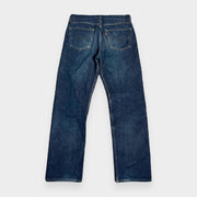 KI-Cover: Vintage Levi's Jeans (W33 L32), glatt gelegt (aus unseren echten Fotos dieses Teils)