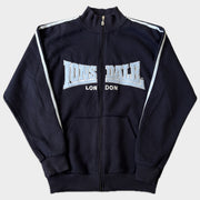 Glattes Liegefoto: Vintage Lonsdale Trackjacket (S) (KI-Aufbereitung, Zustand siehe echte Fotos)