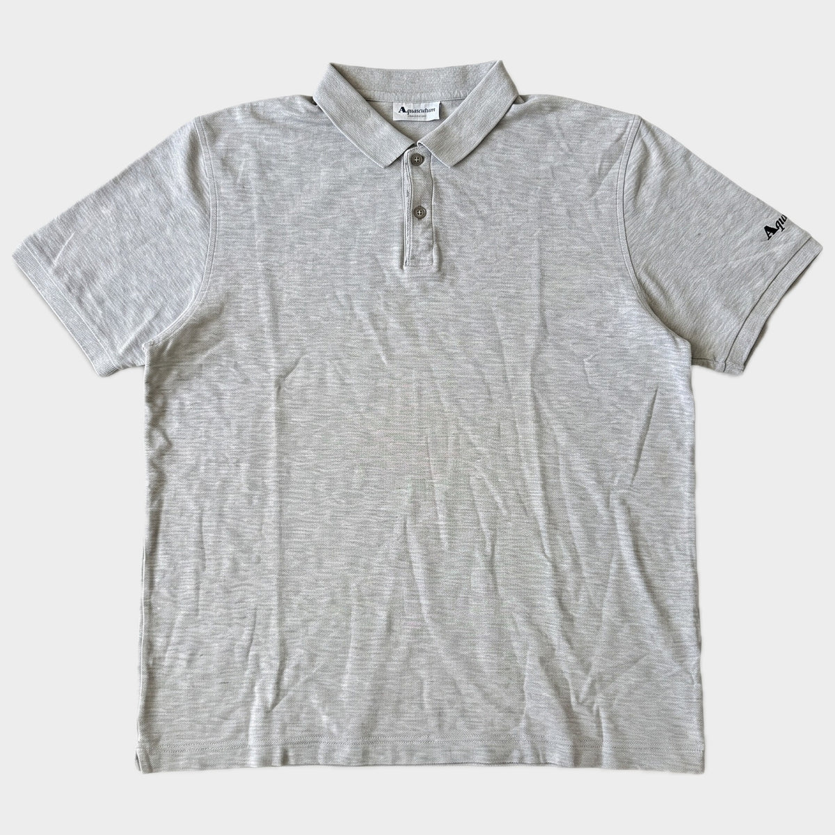 Glattes Liegefoto: Vintage Aquascutum Poloshirt (L) (KI-Aufbereitung, Zustand siehe echte Fotos)