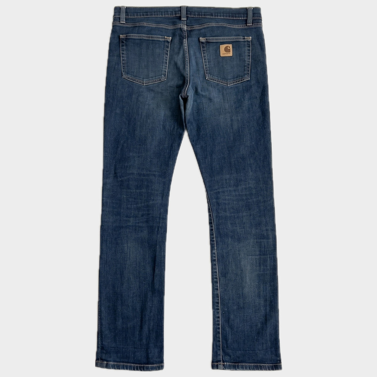 Glattes Liegefoto: Vintage Carhartt Jeans (W36 L34) (KI-Aufbereitung, Zustand siehe echte Fotos)